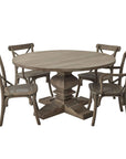 Copgrove round pedestal dining table in bleached hardwood with black iron accents, warm brown tones, 150cm diameter by Sostter at brixbailey.com
