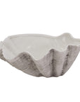 Handcrafted white ceramic shell bowl with artisanal texture, perfect for coastal decor or floral displays. by sostter at brixbailey.com