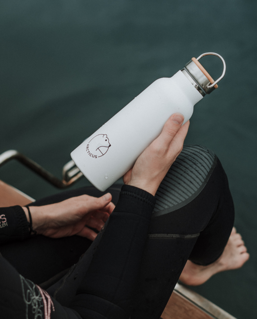 Premium Arctic Bottle, double-wall vacuum-insulated stainless steel, keeps drinks hot or cold, eco-friendly bamboo lid, leak-proof, BPA-free by Arcticus at brixbailey.com