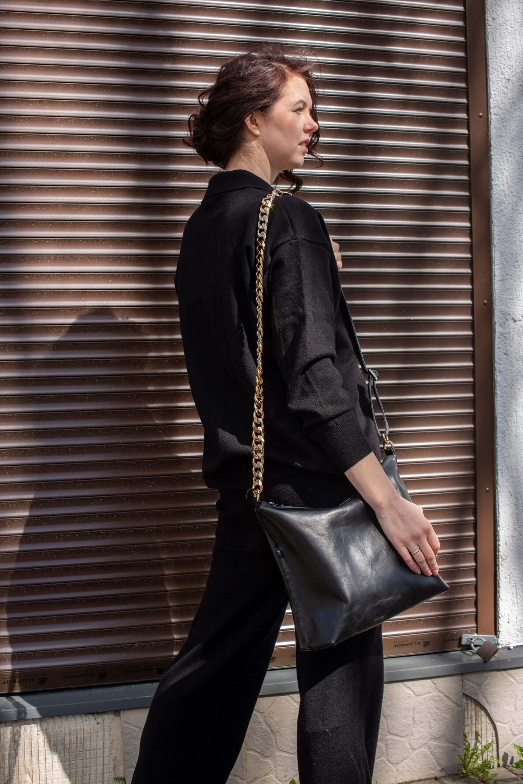 Black Leather Handbag with Metallic Accents, Crossbody