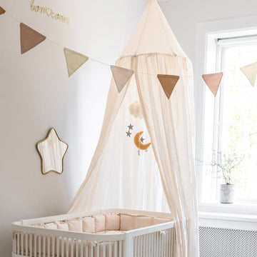 Premium double-sided bunting with eight triangular fabric flags in four stylish shades, perfect for nursery decor and festive occasions by Ella James at brixbailey.com