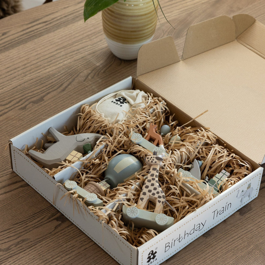 Premium Wooden Birthday Train with Animal Parade, Elephant and Candle Holders, Handcrafted Danish Design, Luxury Baby Gift by Ella James at brixbailey.com