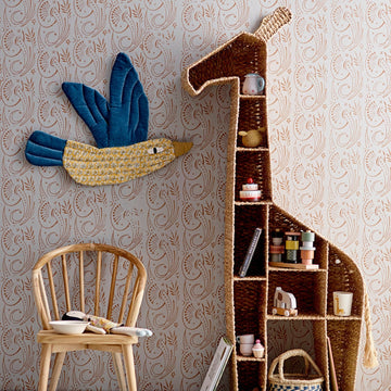 luxury tall giraffe bookcase, stylish safari-themed woven grass shelving unit, premium nursery storage for toys and books by Ella James at brixbailey.com