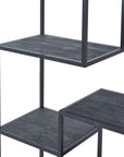 Black metal industrial shelf unit with asymmetrical seven-shelf design and lattice framework for modern home decor. by Sostter at brixbailey.com