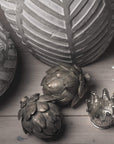 Handcrafted bronze artichoke sculpture with intricate petals and antique patina, perfect for home decor. by Sostter at brixbailey.com