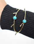 Turquoise/Moonstone Twig Open Brass Bangle - Nature-inspired twig bangle with turquoise stones—bold and earthy.
