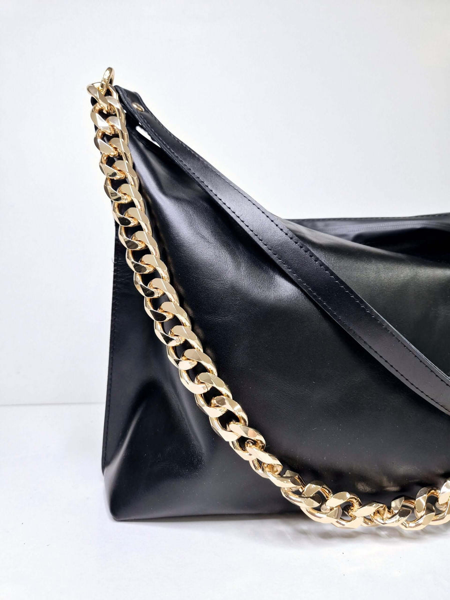 Black Leather Handbag with Metallic Accents, Crossbody