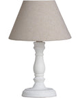 Cyrene table lamp with white wooden base and oatmeal shade, handcrafted beige lighting for home decor by Sostter at brixbailey.com