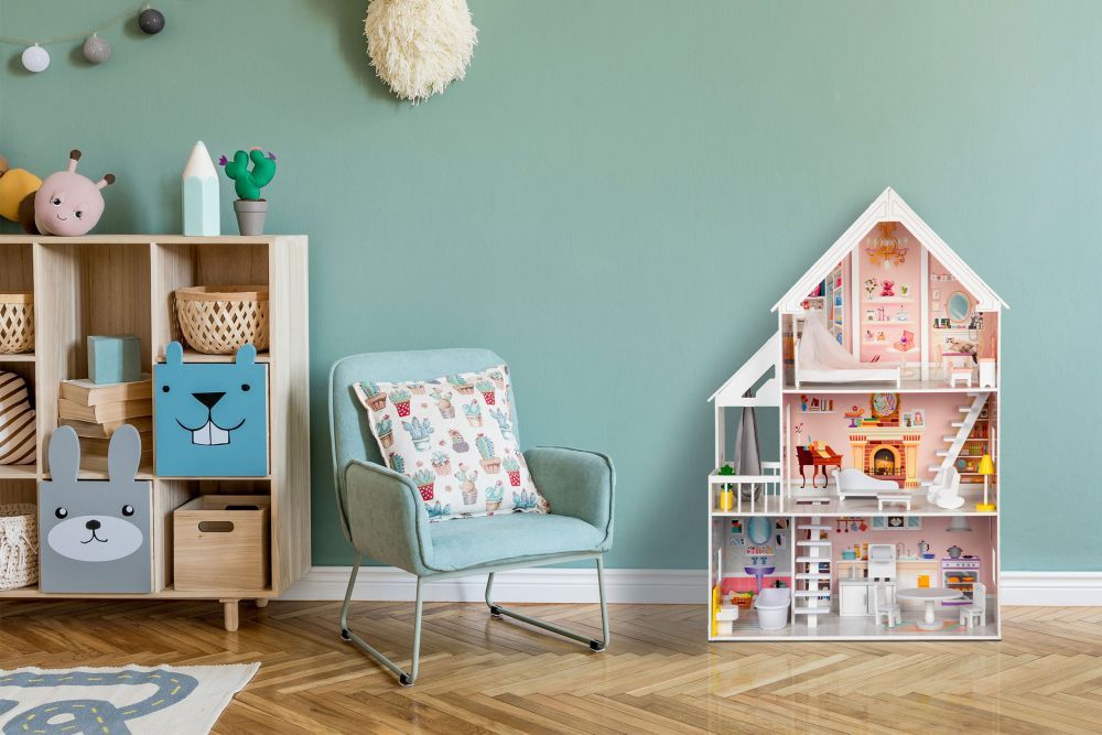 functional view of wooden dollhouse liselle showing spacious room layout and included furniture pieces