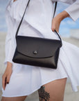 Handcrafted Estonian Leather Clutch - Vegetable-Tanned Elegance by Mirgoods at www.brixbailey.com