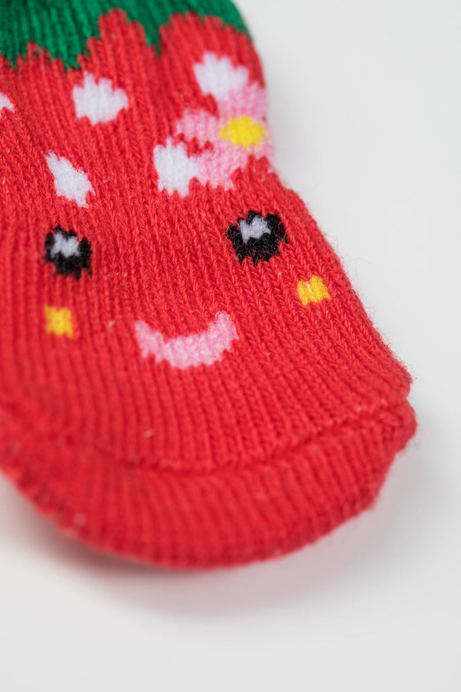 Premium non-slip dog socks, cute strawberry paw protectors for clean dry paws, best-selling pet socks for hardwood tile floors by Body and I at brixbailey.com