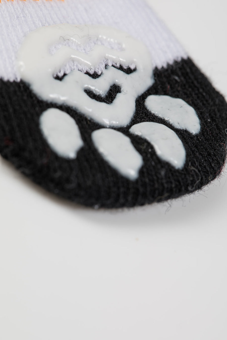 Premium non-slip dog socks, paw protectors for clean dry paws, pack of 3 with pumpkin sneakers heart designs by Body and I at brixbailey.com