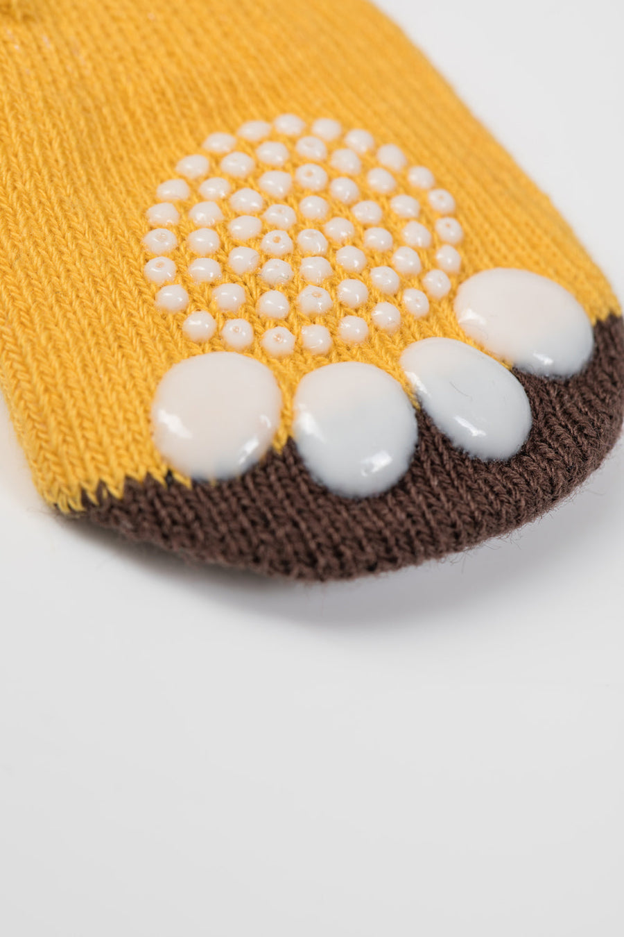 Non-slip dog socks, paw protectors for clean dry paws, cute practical pet accessories, cotton blend traction socks for slippery floors by Body and I at brixbailey.com
