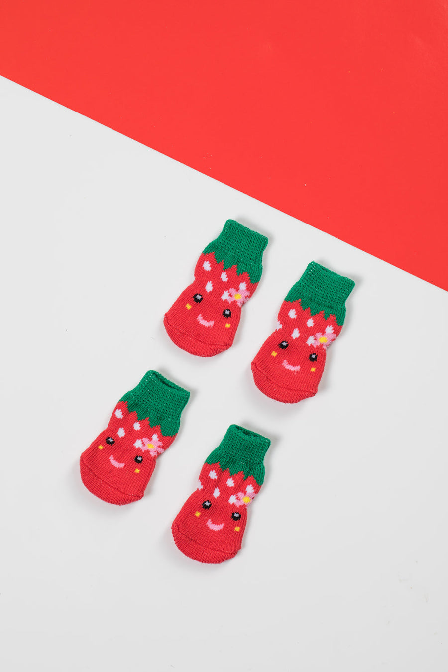 Luxury non-slip dog socks, cute paw protectors for clean dry paws, best-selling strawberry pet socks for hardwood floors by Body and I at brixbailey.com