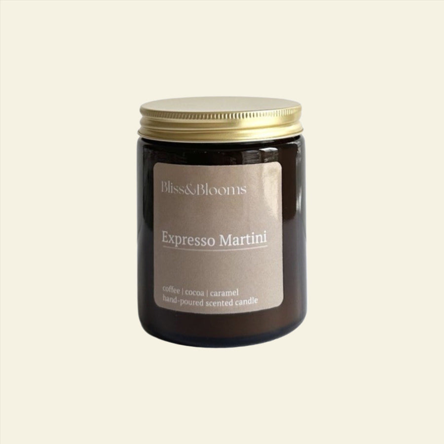 Luxury espresso martini scented candle, handcrafted premium coffee aroma with rum, vodka, and chocolate notes, stylish amber glass jar with gold lid by Bliss & Blooms at brixbailey.com