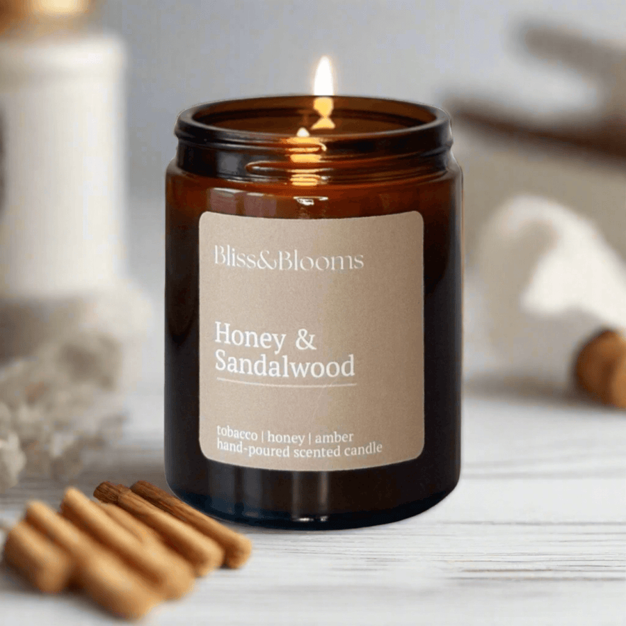 Luxury Honey Sandalwood Scented Candle, Premium Handcrafted Amber Glass Jar with Gold Lid, Warm Woody Aromatic Home Fragrance by Bliss & Blooms at brixbailey.com