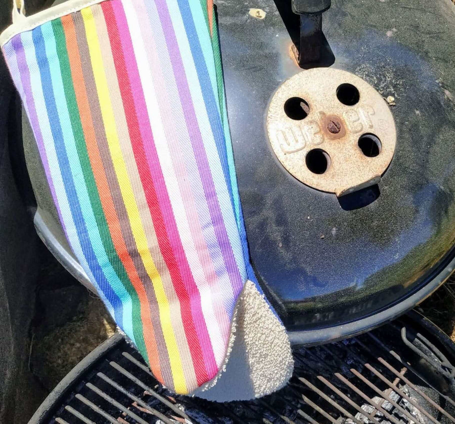 Premium rainbow striped oven glove, long gauntlet style, heat-resistant, handcrafted in UK, sustainable recycled organic fabric, stylish kitchen essential by Maison Elhoria at brixbailey.com