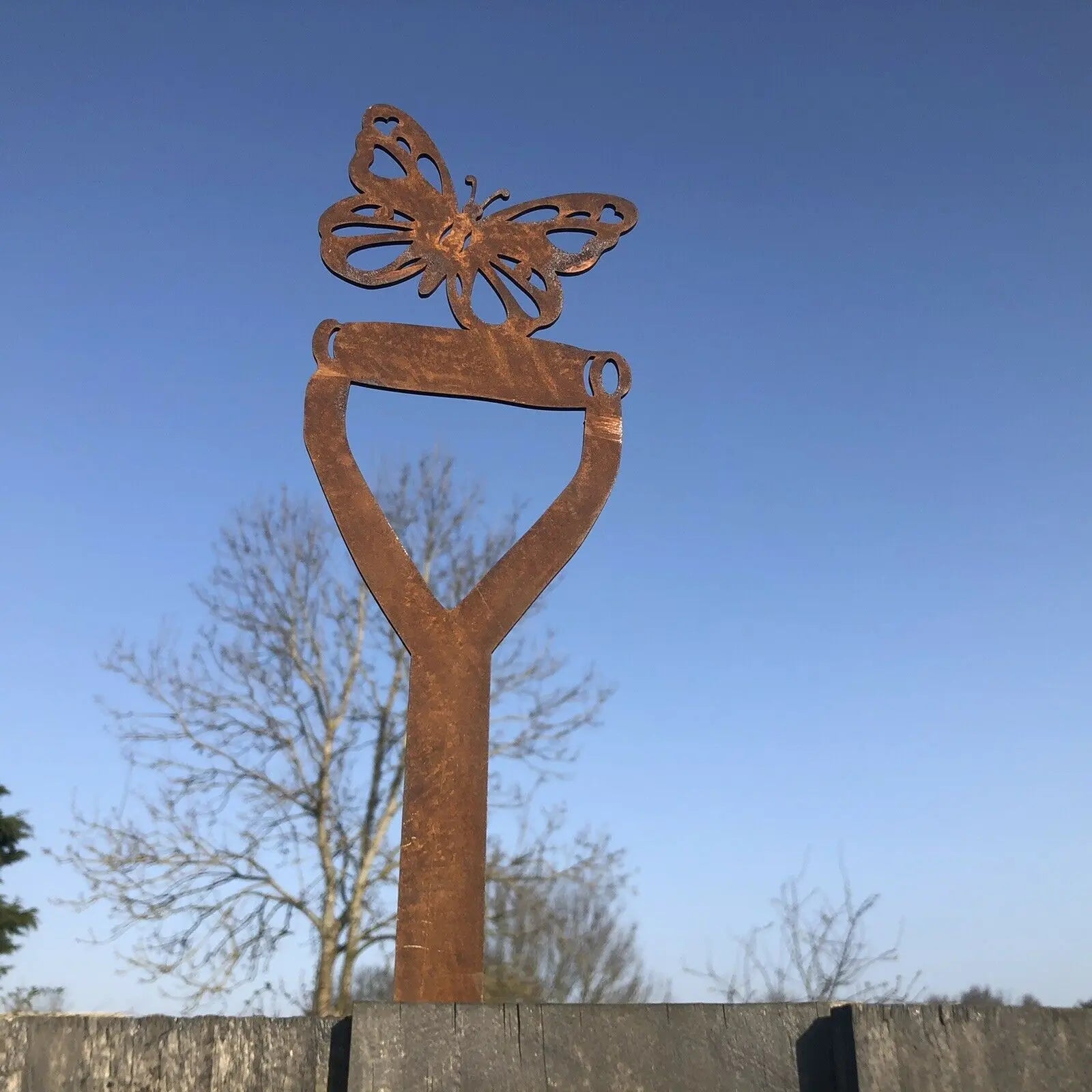 Rusty Metal Butterfly On A Spade Garden Decoration