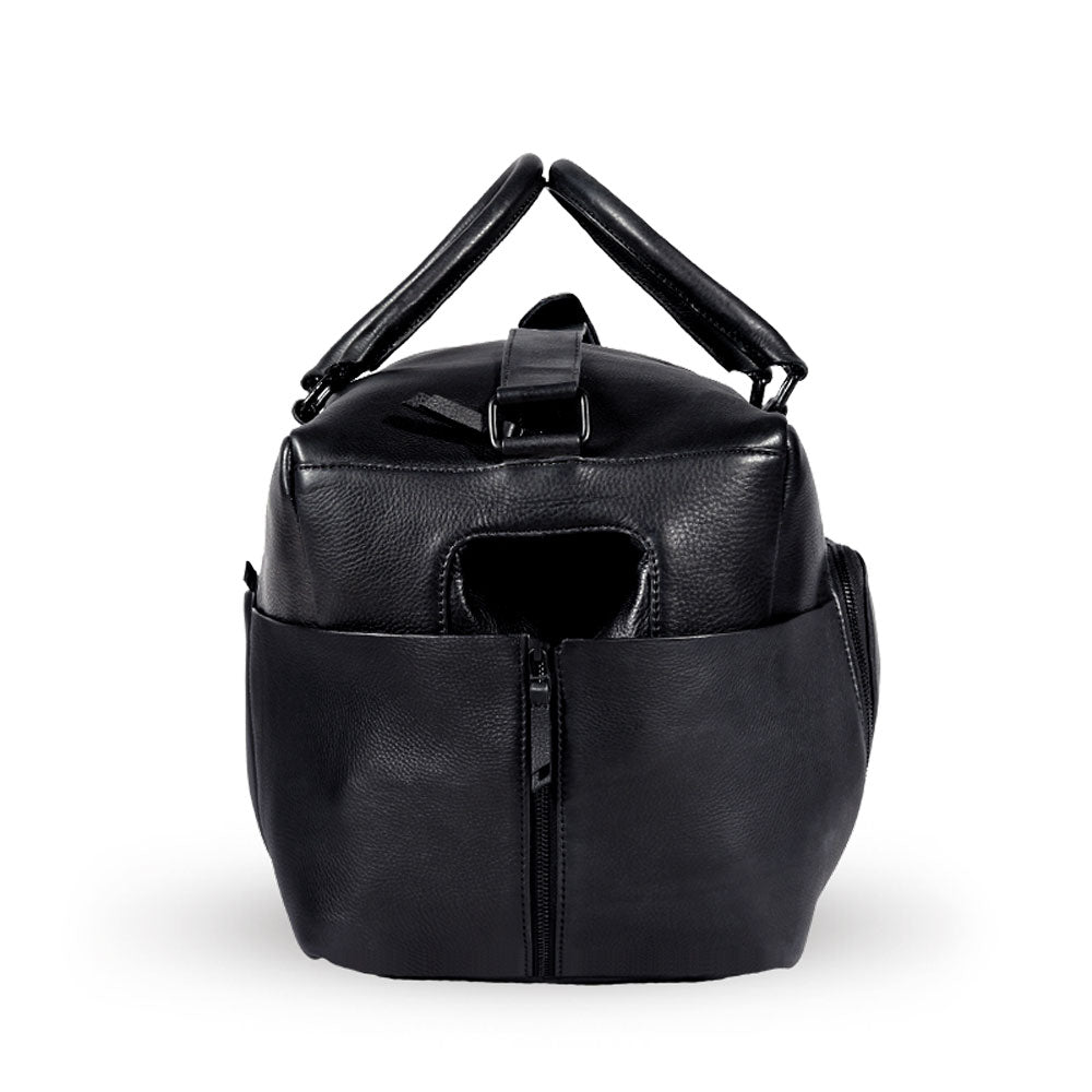 Premium black leather weekender bag, handmade sustainable full grain cowhide, spacious laptop sleeve, antique brass hardware, durable travel companion by Bethikal at brixbailey.com