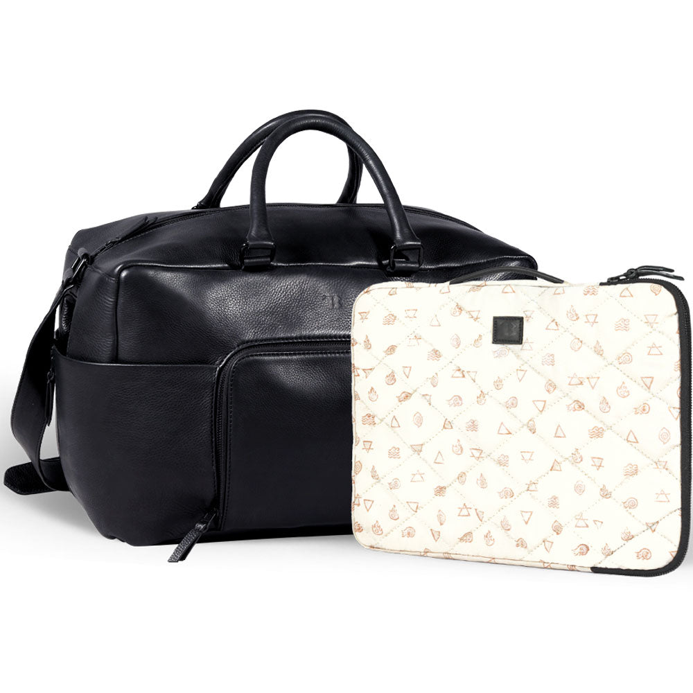 Premium black leather weekender bag, handmade sustainable travel bag with full grain cowhide, antique brass hardware, detachable laptop sleeve by Bethikal at brixbailey.com