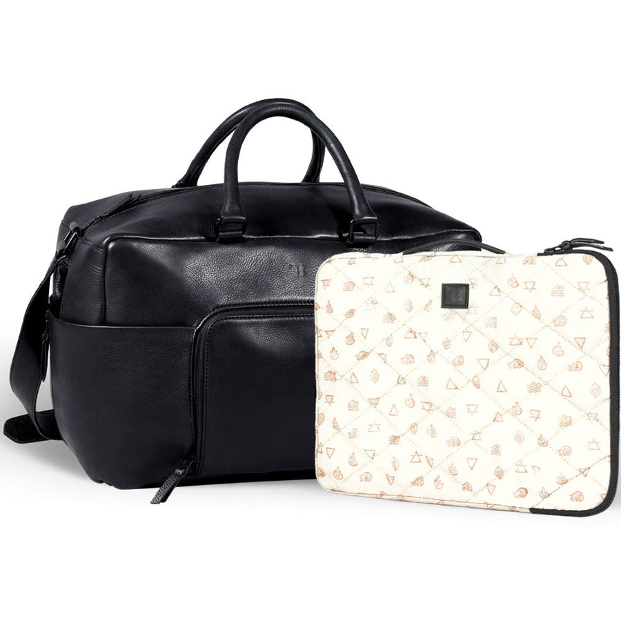 Premium black leather weekender bag, handmade sustainable travel bag with full grain cowhide, antique brass hardware, detachable laptop sleeve by Bethikal at brixbailey.com