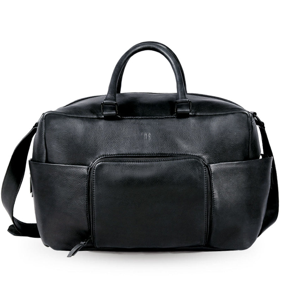 Premium black leather weekender bag, handmade sustainable travel bag with brass hardware, laptop sleeve, spacious compartments by Bethikal at brixbailey.com