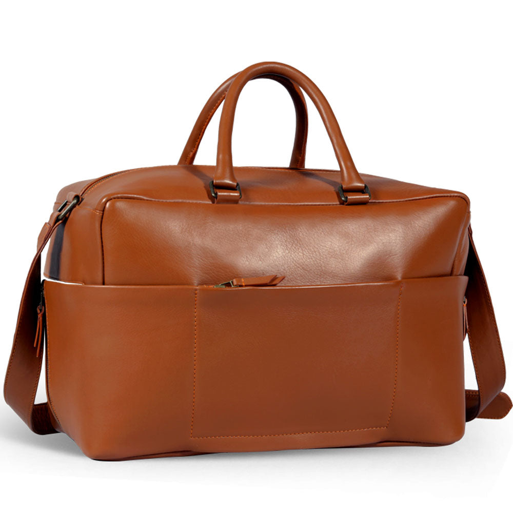 Premium tan leather weekender bag, handmade eco-friendly travel duffle with recycled materials, durable full grain cowhide, antique brass hardware by Bethikal at brixbailey.com