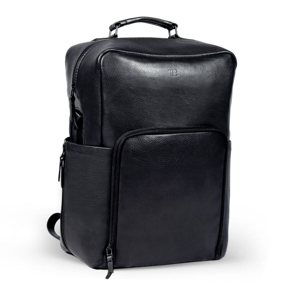 Premium black leather backpack for adventure and travel, handcrafted from recycled full-grain cowhide with antique brass hardware, spacious laptop compartment, and eco-friendly design. by Bethikal at brixbailey.com