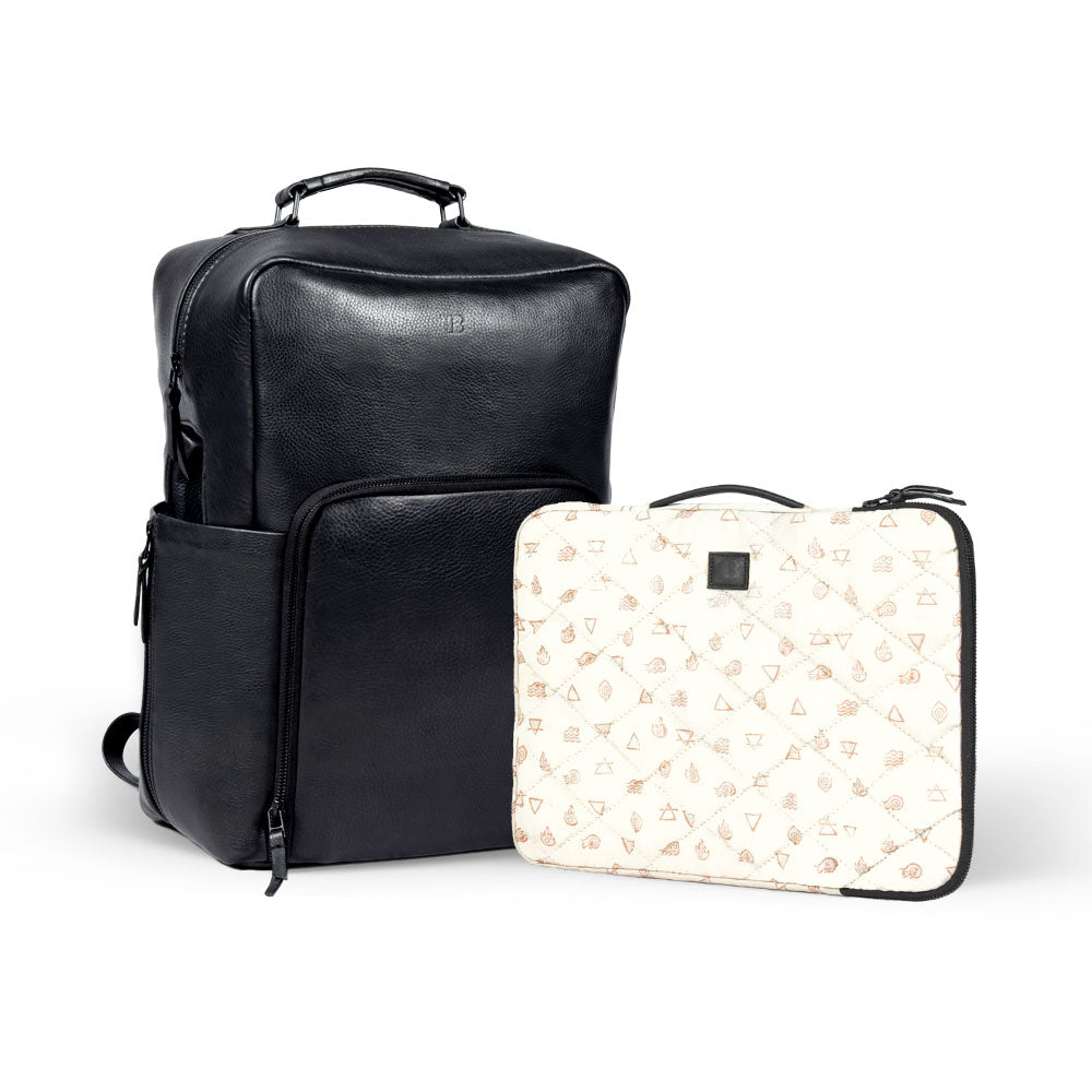 Premium black leather backpack, handcrafted from recycled full-grain cowhide, eco-friendly with antique brass hardware, spacious laptop sleeve, durable travel companion by Bethikal at brixbailey.com