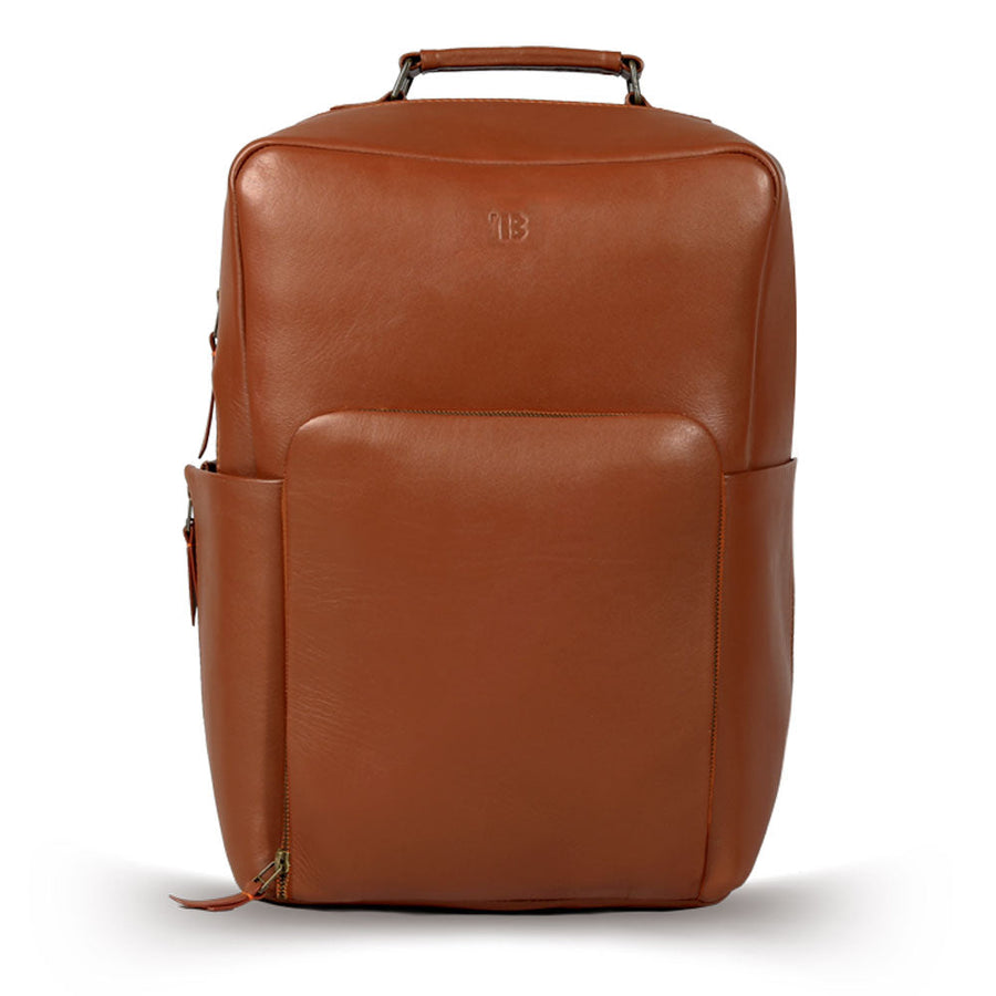 Premium tan leather backpack, sustainable handcrafted full grain cowhide, spacious 20L travel bag with quilted laptop sleeve, antique brass hardware by Bethikal at brixbailey.com