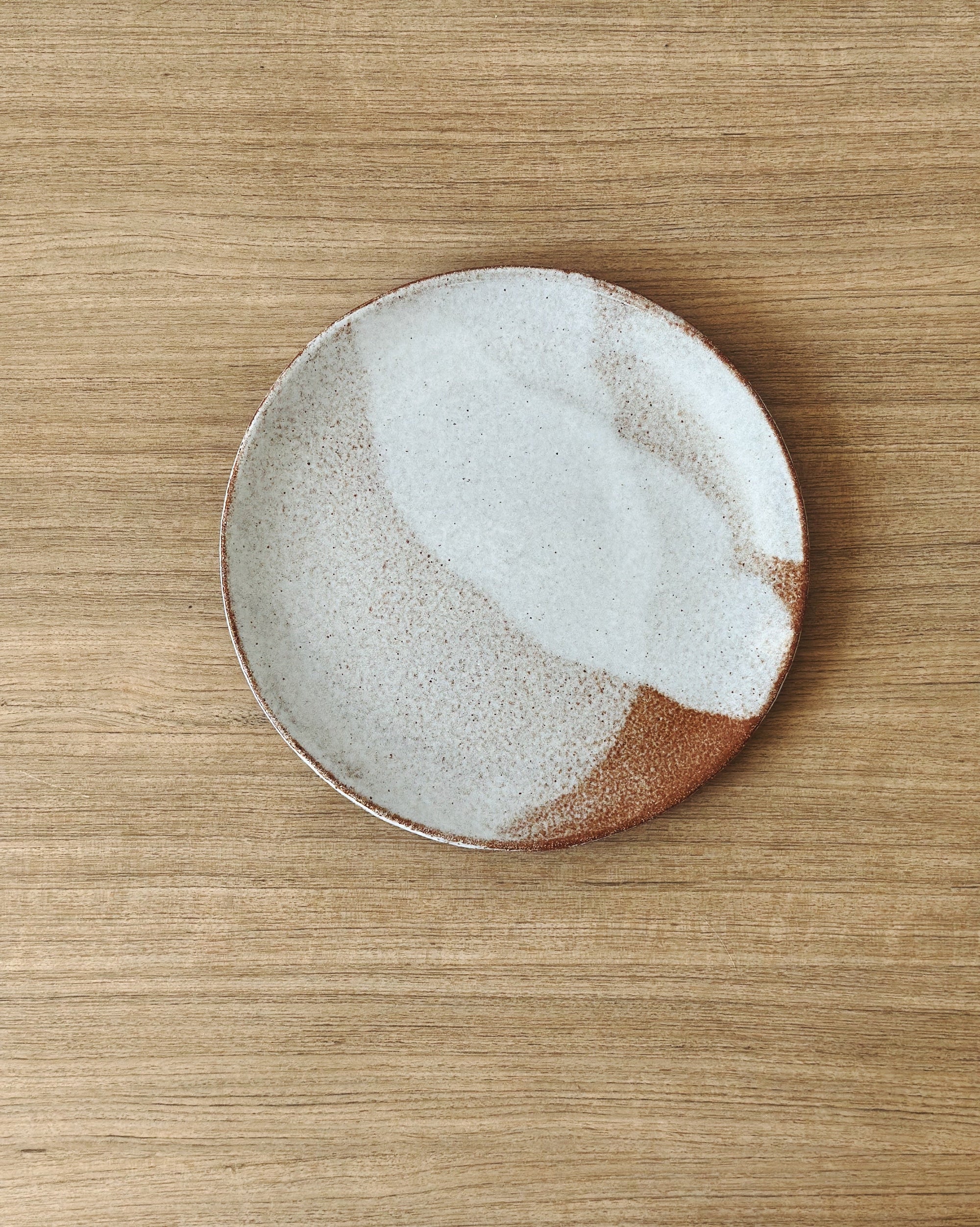 Handmade ceramic plates – caramel clay with white glaze