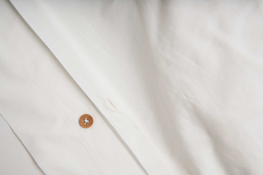 Luxury 100% organic cotton percale duvet cover, premium white handcrafted duvet, soft breathable percale weave, best-selling king or double size by Karpāsa London at brixbailey.com