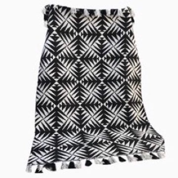 Luxury monochrome flat weave rug, handmade in India, premium pure wool, geometric design, stylish tassels, best-selling neutral tones by Maria Starling Design at brixbailey.com