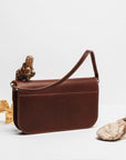 Versatile Model Baguette – Elegant Leather Crossbody Bag by Craftory at brixbailey.com