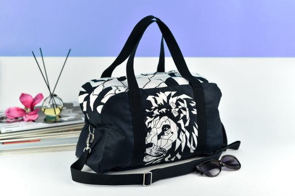 Black Travel Bag with White Lion Motif