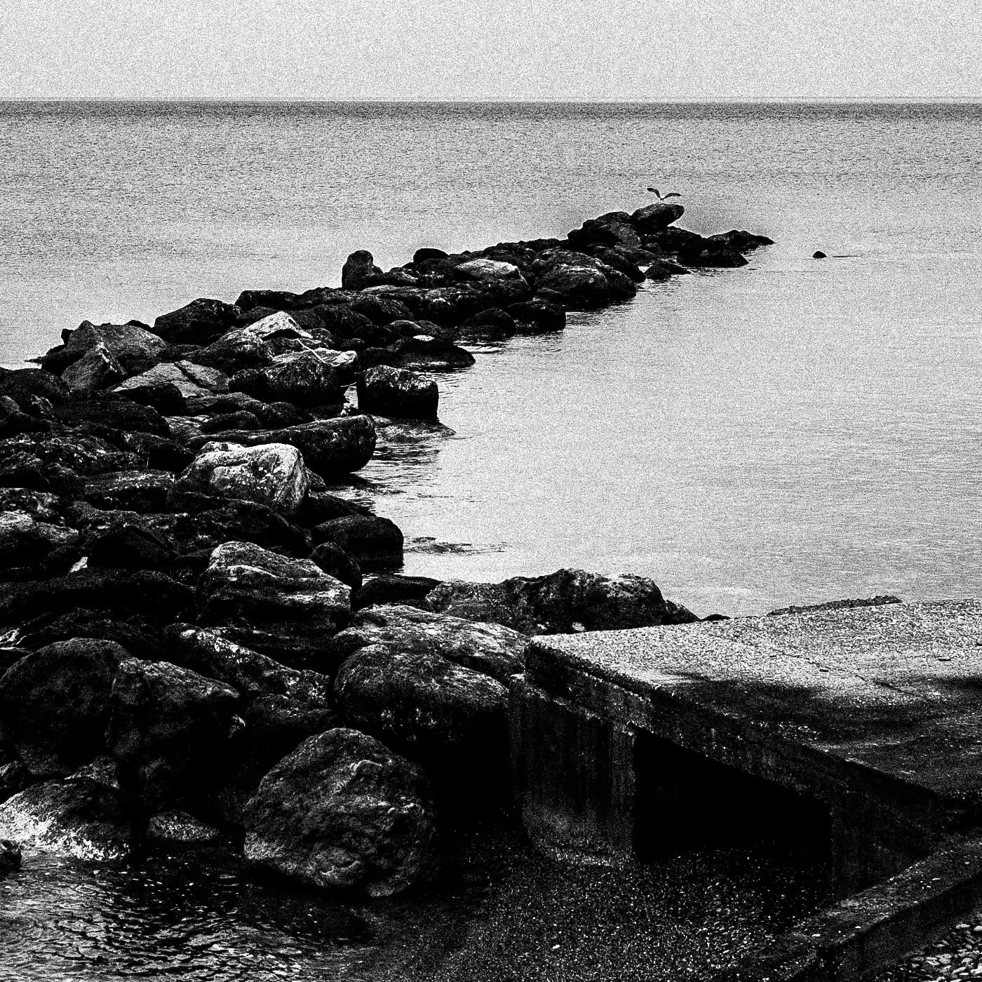 DISCOVER THE SERENITY OF DIAFANI: A CAPTIVATING BLACK AND WHITE LANDSCAPE PRINT by George Tatakis at brixbailey.com