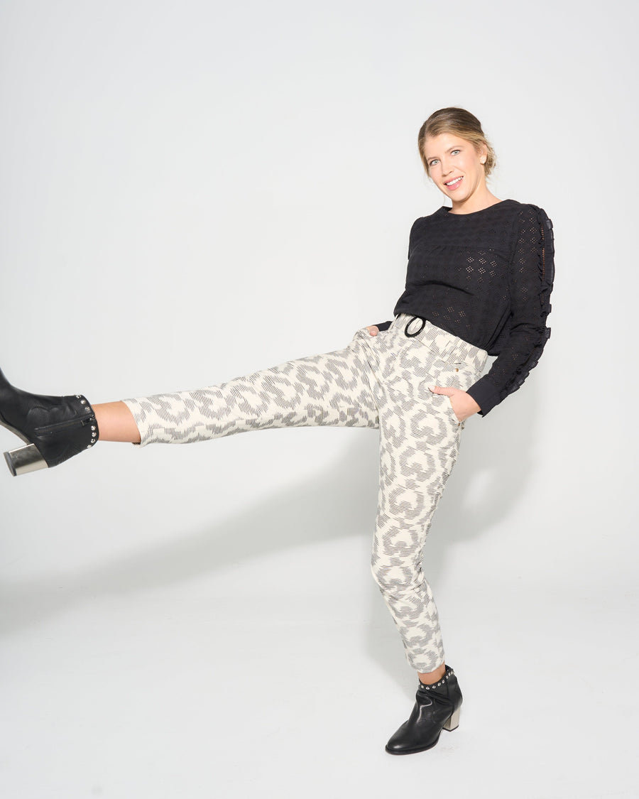 Luxury premium tapered pants with high waist, double front pleats, detachable belt, and pockets, 100% cotton IKAT fabric by GILD at brixbailey.com