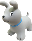 a soft grey jumpy dog toy sitting in a cozy nursery, ready for a child's cuddle