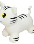 a playful white cat hopper toy bouncing joyfully on a sunny lawn