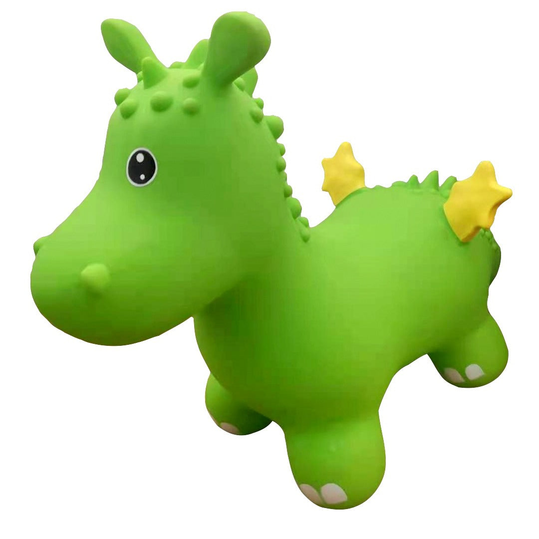 softly lit green dragon hopper toy for toddlers on a cozy nursery rug