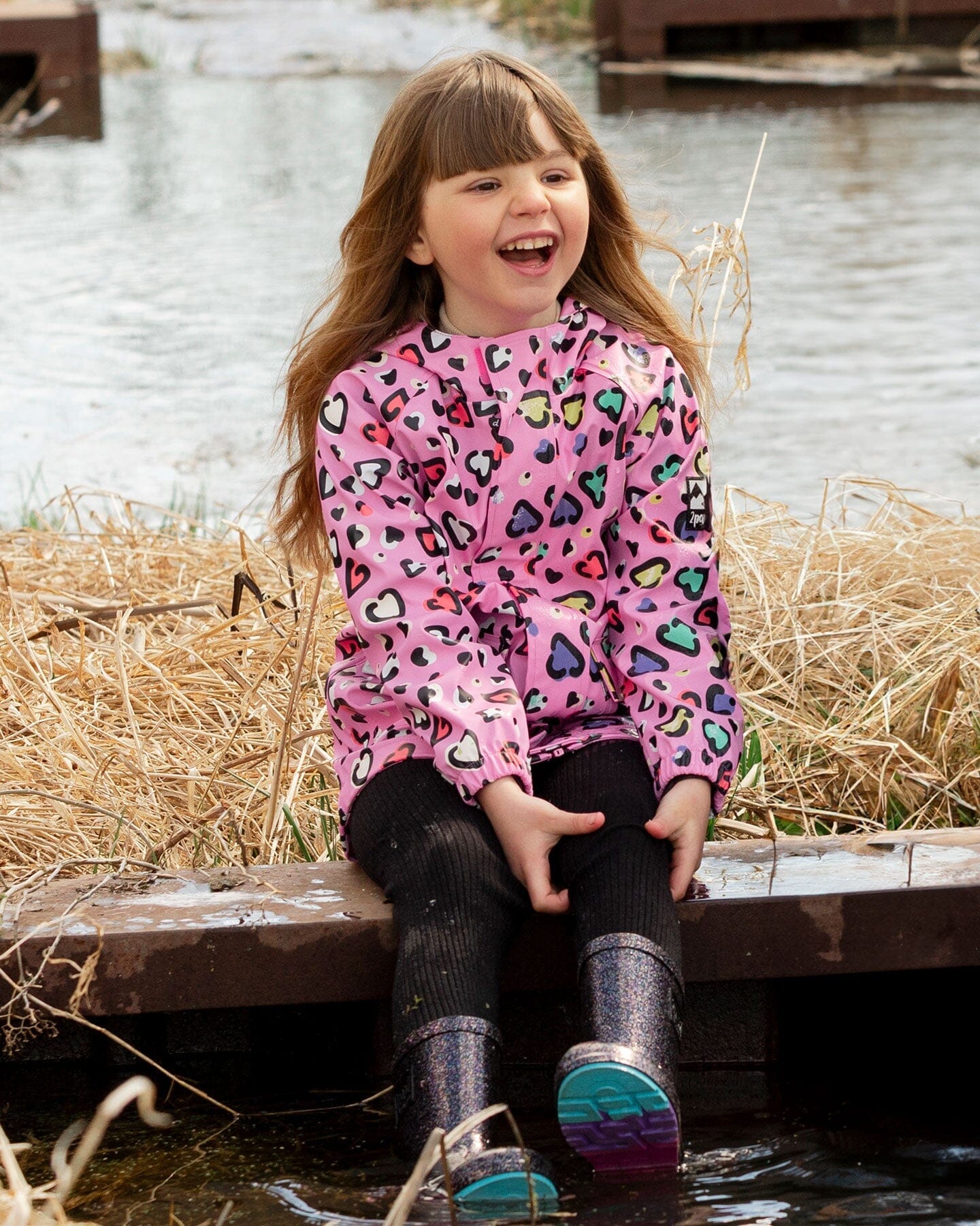 Pink raincoat with color-changing hearts-1