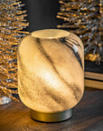 Luxury amber cordless lamp with black marble glass shade and gold metal base, battery-powered ambient lighting for home decor by Ella James at brixbailey.com