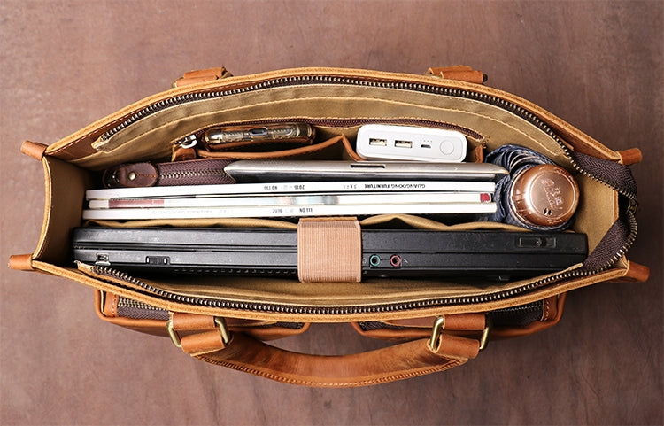 Premium Dagmar vintage leather briefcase, luxury crazy horse leather messenger bag for laptop and essentials by Steel Horse Leather at brixbailey.com