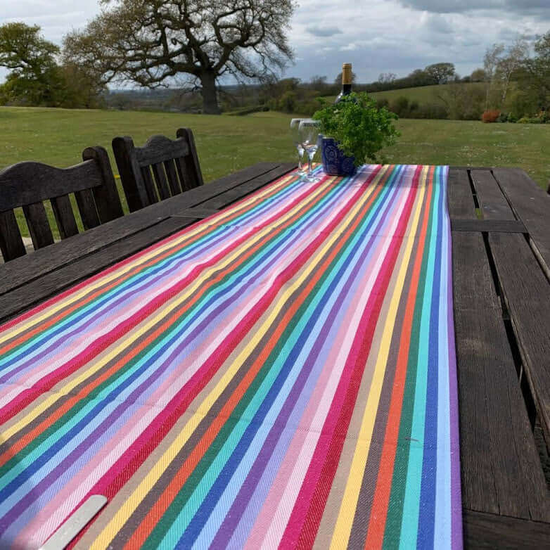 Recycled cotton rainbow table runner, luxury handcrafted striped party decor, premium 2.5m long stylish table linen by Maison Elhoria at brixbailey.com