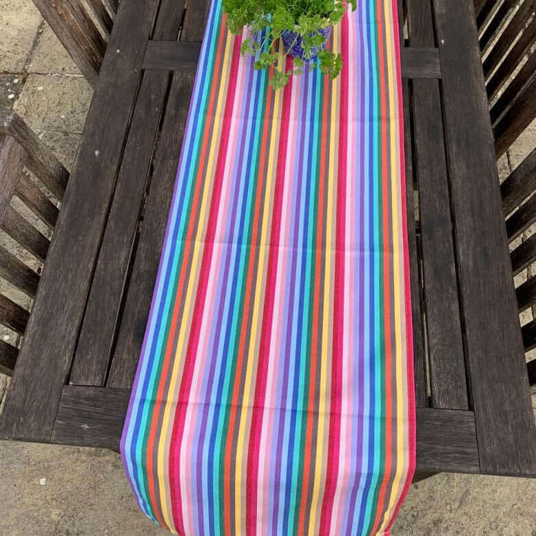 Luxury rainbow table runner, 100% cotton recycled organic, handcrafted in England, stylish 2.5m long, premium party decor by Maison Elhoria at brixbailey.com