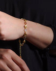 Gold Sara Mixed Gemstone Bracelet: Peach Moonstone, Labradorite & Moonstone