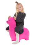 bold pink alpaca jumpy toy ready for action on a bright background