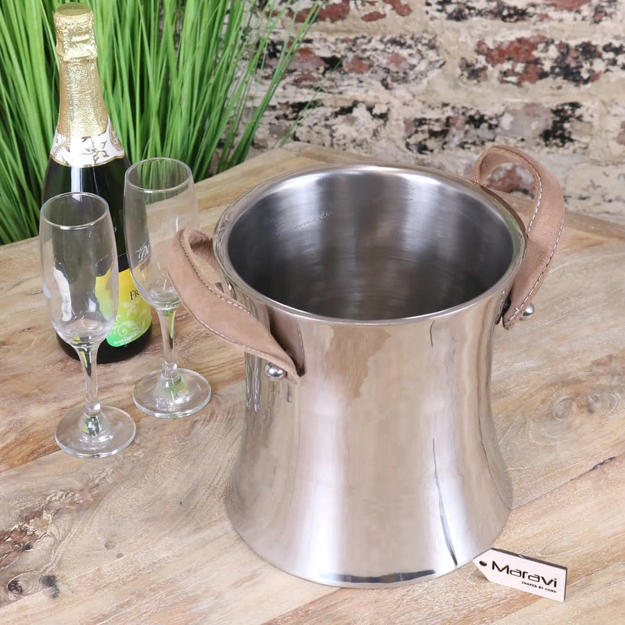 Navin luxury champagne ice bucket, premium double wall aluminum, stylish polished silver, handcrafted leather handles, best-selling elegant drink cooler by Maravi at brixbailey.com