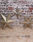 Luxury Tara Trio gold star wall art set, premium distressed metal celestial decor, stylish vintage-inspired home accents by Maravi at brixbailey.com