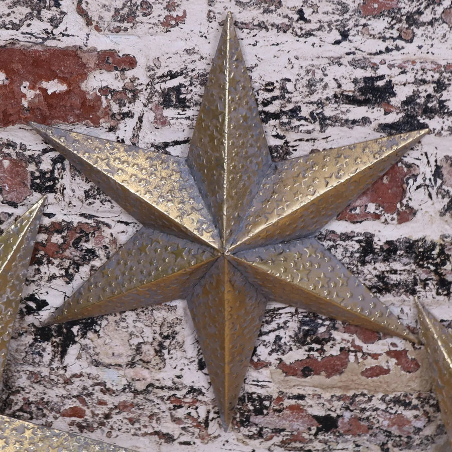 Luxury Tara Trio gold star wall art set, distressed vintage metal stars for celestial home decor by Maravi at brixbailey.com